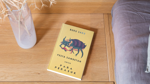 “Buku Saku Pesta Sambetan untuk Para Perasuk”, Buku Pendamping Film dengan Konsep Tak Biasa